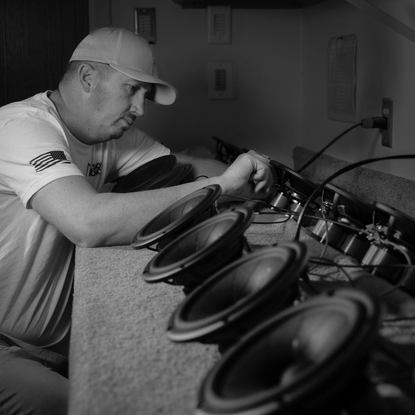 A craftsperson burning in a row of Autobiography drivers